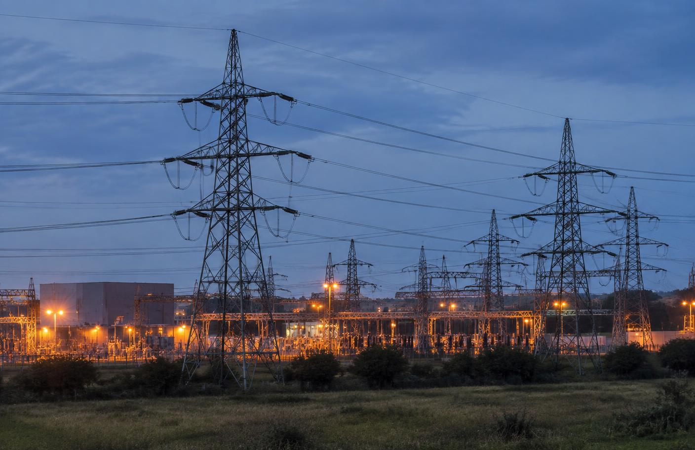 UK electricity substation and power infrastructure at dusk